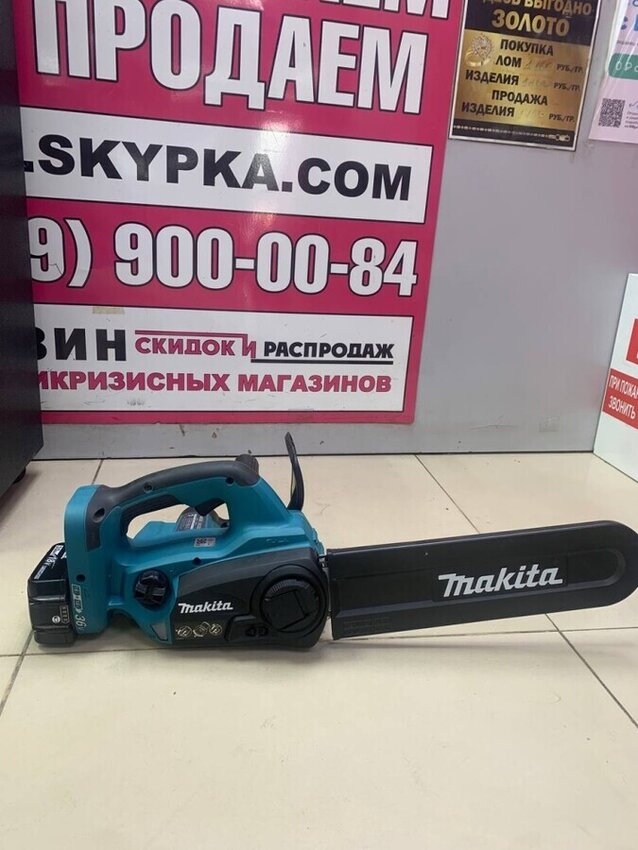 Цепная электропила Makita DUC302